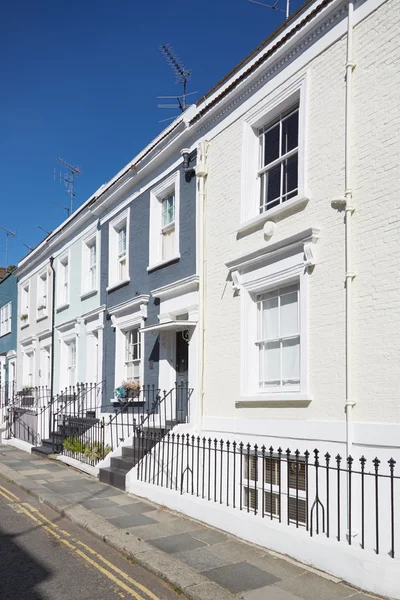 Colorful English houses facades, blue sky in London — Stock Photo, Image