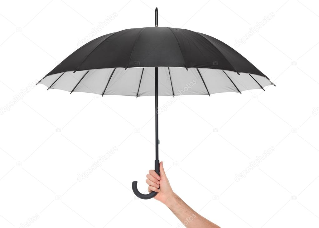 Hand holding black umbrella on white, clipping path