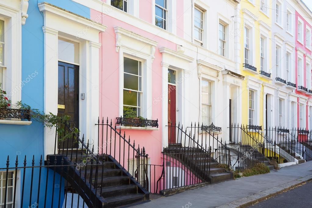Colorful English houses facades in pastel colors in London