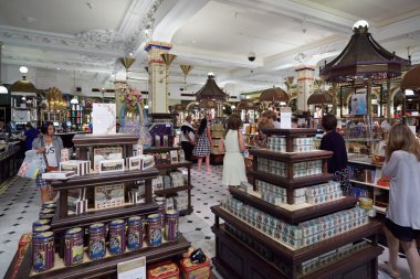Harrods department store interior, candies and sweets area, in London clipart