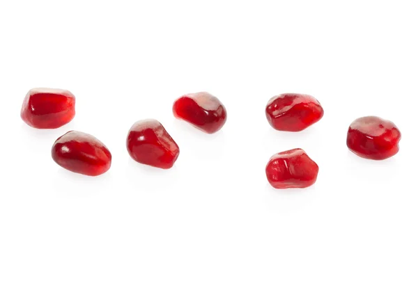 Pomegranate red seeds collection isolated on white — Stock Photo, Image