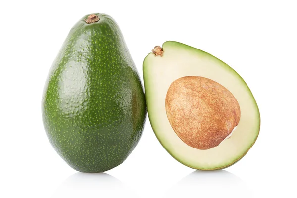 Avocado en sectie op wit, uitknippad — Stockfoto