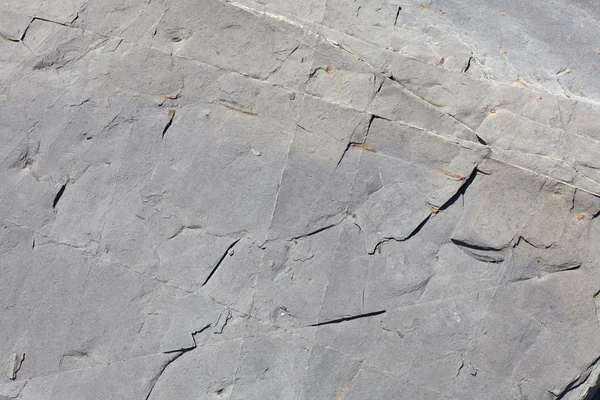 Unneven cinza pedra textura fundo — Fotografia de Stock
