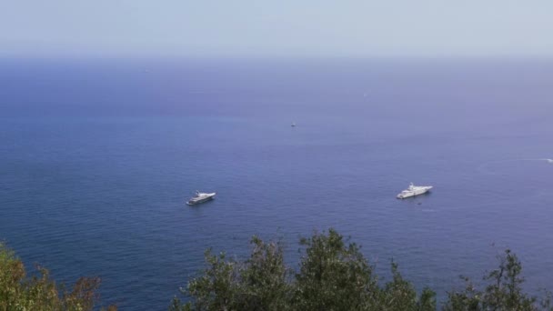 Mediterranean blue, calm sea with boats and horizon in the morning — Stock Video