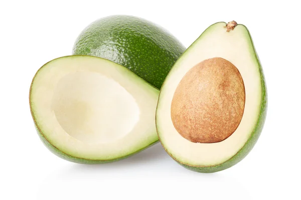 Avocado vruchten en de helft op wit, uitknippad — Stockfoto