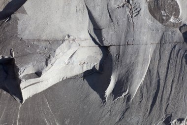 Gri taş doku arka planda güneş ışığı