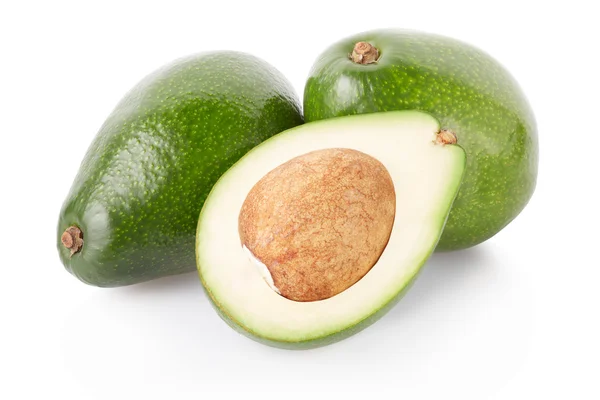 Avocado's en de helft op wit, uitknippad — Stockfoto