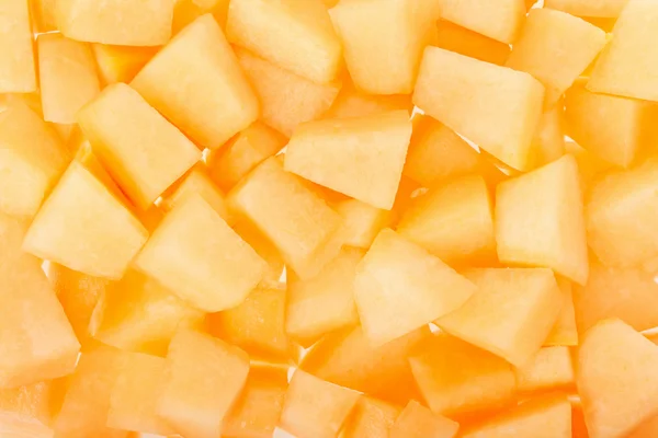 Cantaloupe melon chunks texture background — Stock Photo, Image