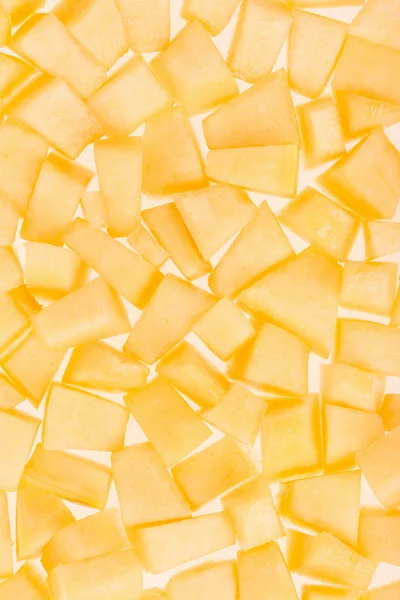Cantaloupe melon pieces texture background — Stock Photo, Image
