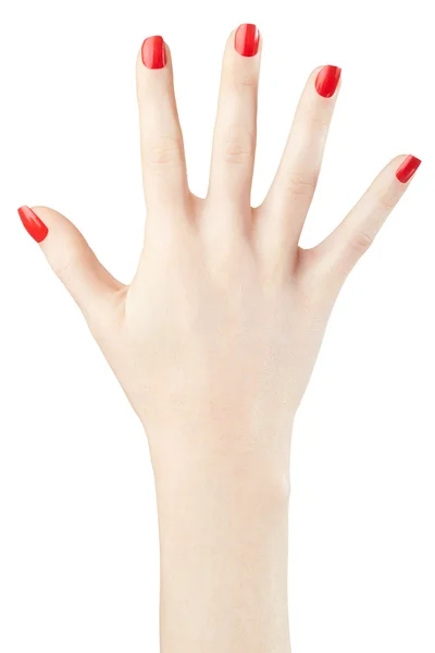 Mano de mujer con manicura esmaltada de uñas roja levantada — Foto de Stock