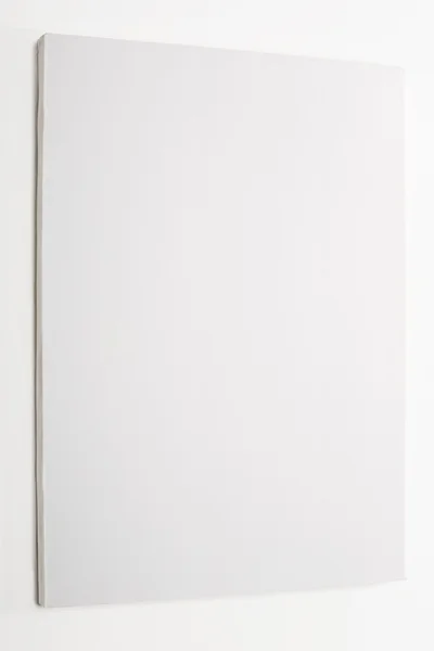 White canvas on white wall — Stock Photo, Image