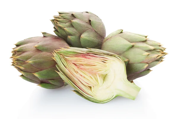 Artichokes group and half on white — Stock Photo, Image