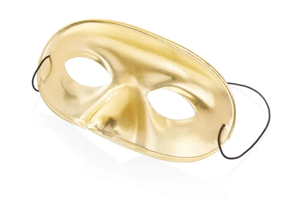 Карнавальная золотая маска на белом — стоковое фото