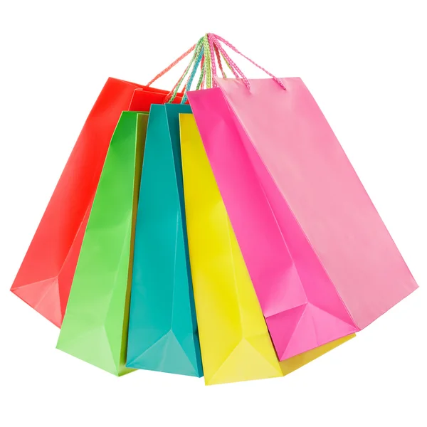 Bolsas de compras de papel colorido en blanco —  Fotos de Stock
