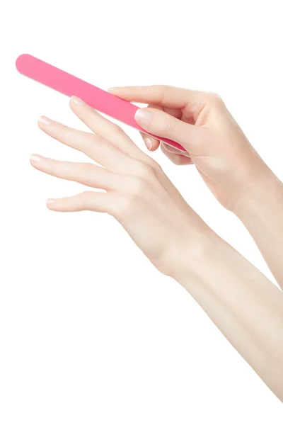 Female hands manicure with nail file on white — Stock Image Female hands manicure with nail file on white Stock Image
