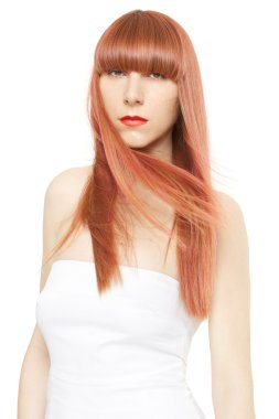 Red hair. Young woman with long, straight hair in wind clipart