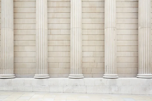 White classical columns and wall background with stone floor — Stock Photo, Image