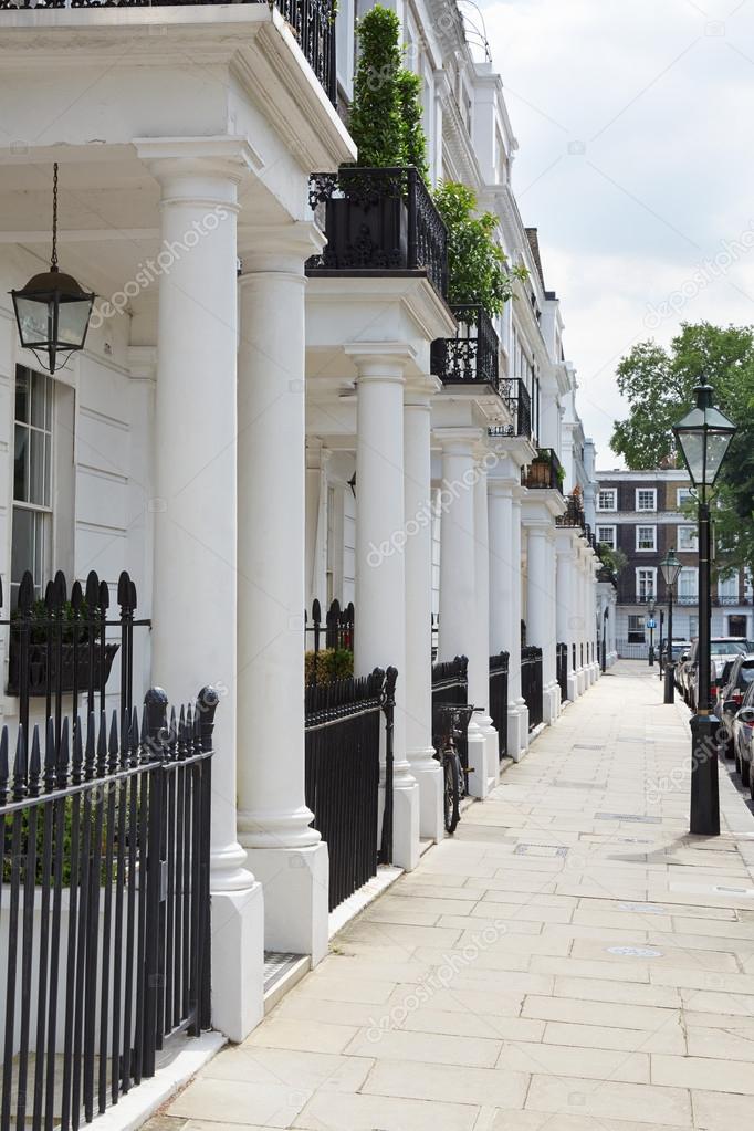 Row of beautiful white Edwardian houses in Kensington, London