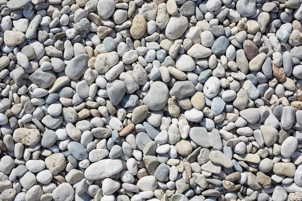 Pebbles on the beach, abstract stone background — Stock Photo, Image