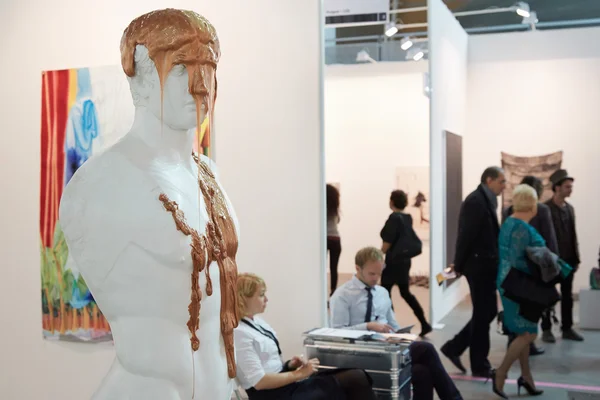 Artissima, contemporary art fair opening with sculpture and people — стокове фото