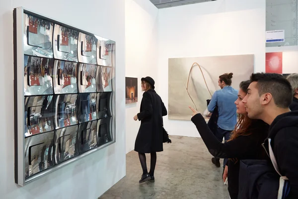 Artissima, contemporary art fair opening with people looking artworks — ストック写真