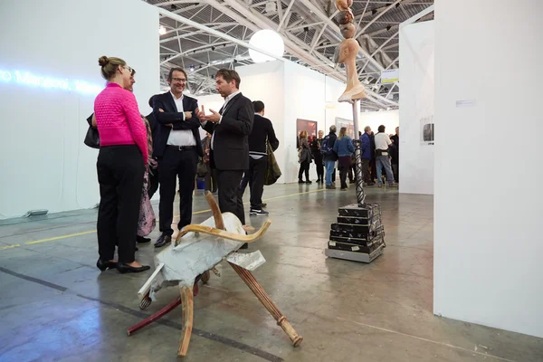 Artissima, contemporary art fair opening with people talking — ストック写真