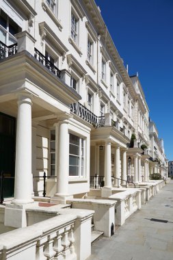 White luxury houses facades in London in a sunny day