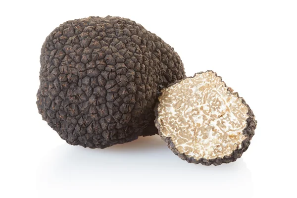 Black truffle and half on white — Stock Photo, Image