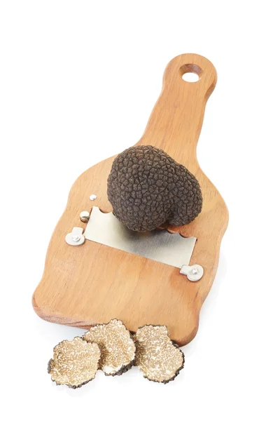 Trancheuse de truffe noire, tranches et truffe en bois sur blanc — Photo