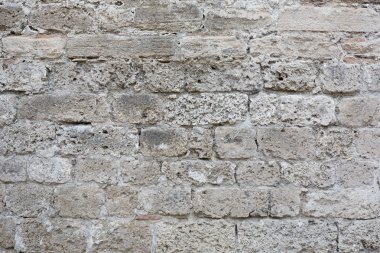 Gri, yıpranmış taş bloklar doku arka plan duvar