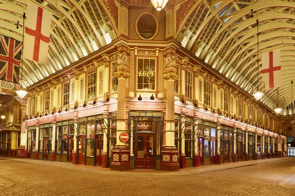 Leadenhall covered market interior at night in London — стокове фото