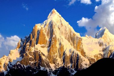 Sharp rocks of the Paiju peak 6,610 m above sea level near the K2 mountain   clipart