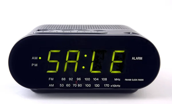 Годинник Радіо зі словом SALE — стокове фото