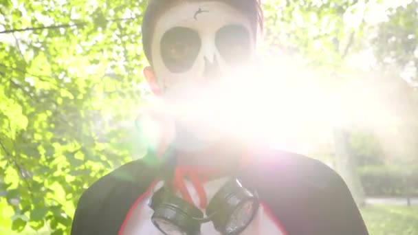 Portrait Boy Face Painted Skull Halloween Costume Park — Stock Video