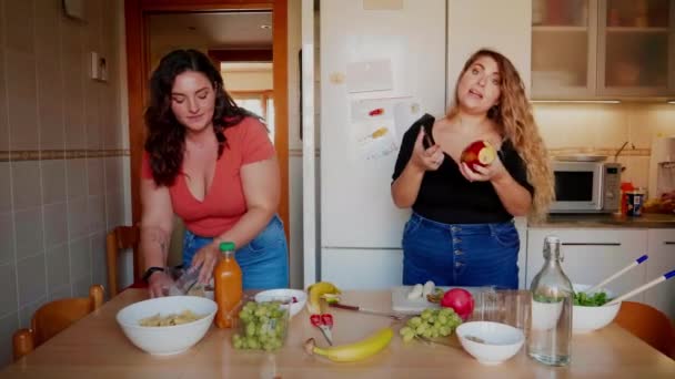 Three Young Women Preparing Fruit Salad Kitchen — Stock Video