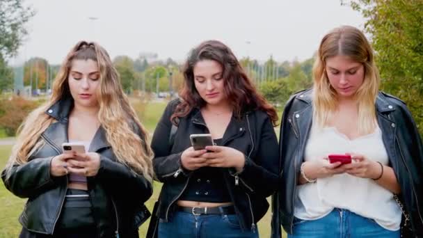 Portrait Three Young Women Smart Phones Outdoors — 图库视频影像