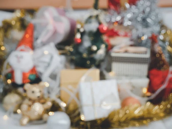 Blurred Christmas Gift Boxes Pine Tree Santa Claus Ball Ribbon — Stock Fotó
