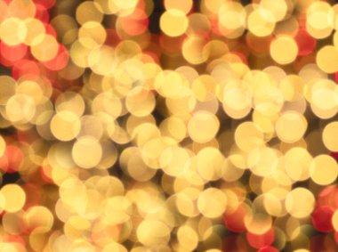 Noel veya Yeni Yıl veya festival arka planı için dokulu altın parıltılı duvar kağıdı, soyut odaklanmış bokeh ışıkları arka plan
