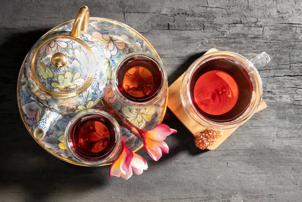 Freshly Brewed Tea Glass Cup Plumeria Flower Cinnamon Sugar Stick — Stock Photo, Image
