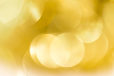 Soyut köpüklü ışık bokeh altın arka plan üzerinde defocused