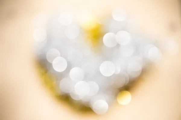 Abstrato bokeh colorido com fundo borrado forma de coração — Fotografia de Stock