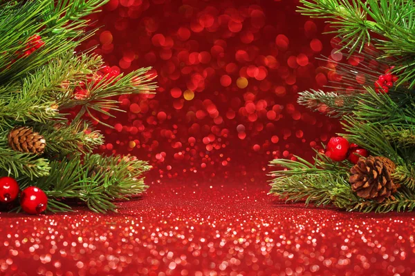 Christmas Tree Branches Glittering Red Background — Stock Photo, Image