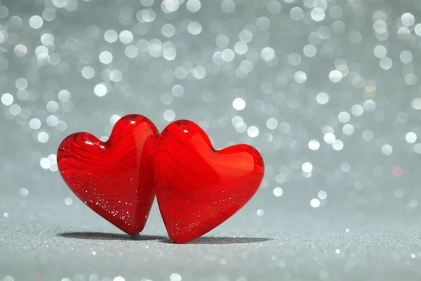 Shiny red hearts background — Stock Photo, Image