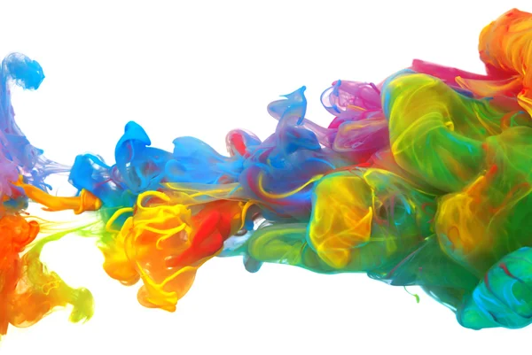 Clouds of bright colorful ink mixing in water — Stock Photo, Image