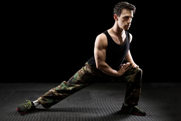 Athletic Man Stretching — Stock Photo, Image