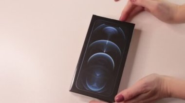 Nizhny Novgorod, Russia - February 14, 2021: New smartphone iPhone 12 Pro Max color Pacific Blue