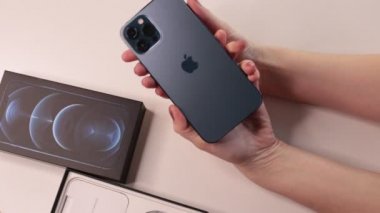 Nizhny Novgorod, Russia - February 14, 2021: New smartphone iPhone 12 Pro Max color Pacific Blue