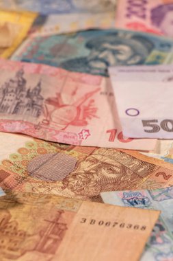 Ukrayna Hrivnia 'sının bir kompozisyonu. UAH banknotları, konuların iş, bankacılık, medya vs. olarak resmedilmesi için büyük seçenekler sunar.