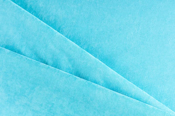窗帘织物帆布 浅蓝色 有对角线褶皱 — 图库照片