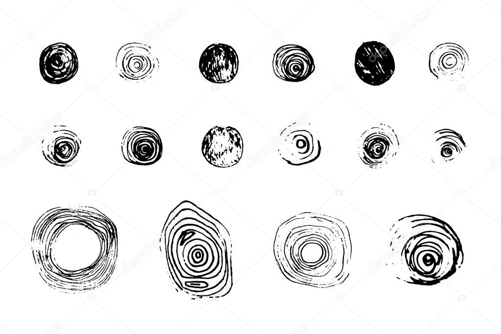 Set of isolated black brush textured round shapes
